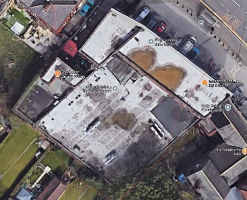 3 of 10 - roof with water ponding in depressions due to deflected planks