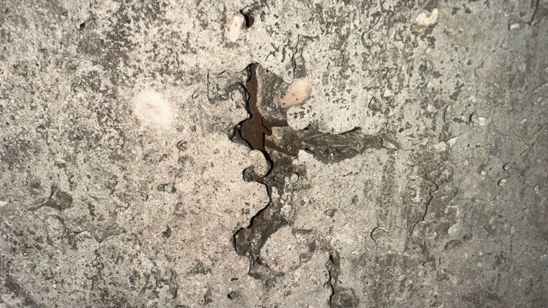 6 of 10 - Corroded Steel in Voided Surface